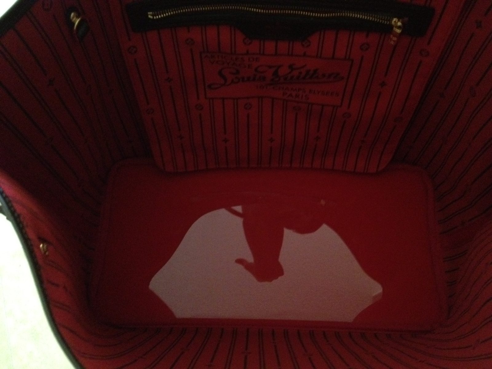 Vibrant Red base shaper in a Louis Vuitton Neverfull GM. The bag is not included.