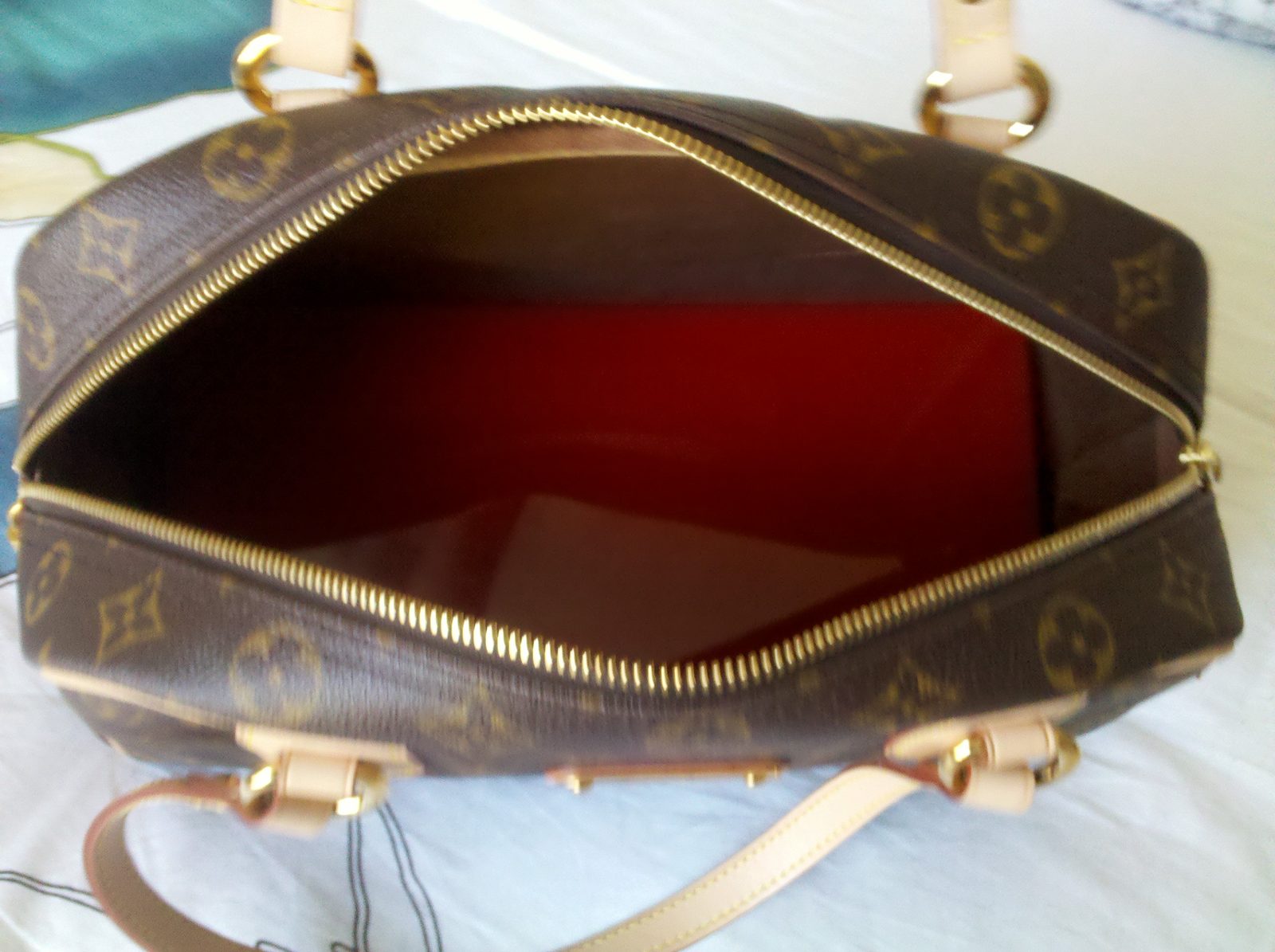 Vibrant Red base shaper in a Louis Vuitton Speedy 30. The bag is not included.